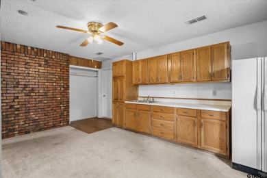 Here is your opportunity to own a big, beautiful home located on on Holly Lake Ranch Golf Club in Texas - for sale on GolfHomes.com, golf home, golf lot