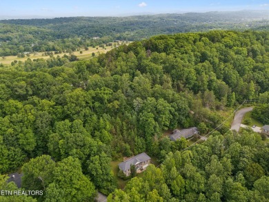 Ready for a new owner! About 5 minutes to Oak Ridge or head west on Oak Ridge Country Club in Tennessee - for sale on GolfHomes.com, golf home, golf lot