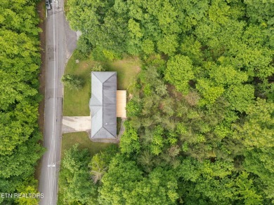 Ready for a new owner! About 5 minutes to Oak Ridge or head west on Oak Ridge Country Club in Tennessee - for sale on GolfHomes.com, golf home, golf lot