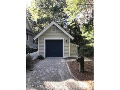 Nestled in the tranquil maritime forest of Bald Head Island on Bald Head Island Golf Club in North Carolina - for sale on GolfHomes.com, golf home, golf lot