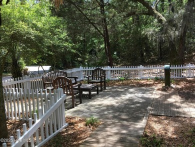 Nestled in the tranquil maritime forest of Bald Head Island on Bald Head Island Golf Club in North Carolina - for sale on GolfHomes.com, golf home, golf lot