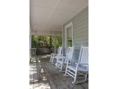 Nestled in the tranquil maritime forest of Bald Head Island on Bald Head Island Golf Club in North Carolina - for sale on GolfHomes.com, golf home, golf lot