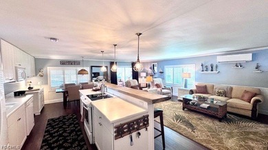 WATERFRONT HOME WITH BOAT DOCK/LIFT. Welcome to your dream home on Riverbend Golf and Country Club in Florida - for sale on GolfHomes.com, golf home, golf lot