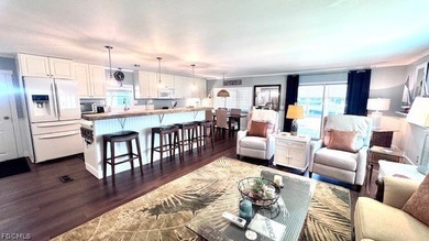 WATERFRONT HOME WITH BOAT DOCK/LIFT. Welcome to your dream home on Riverbend Golf and Country Club in Florida - for sale on GolfHomes.com, golf home, golf lot