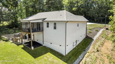 Built in 2023, this like-new home is ideally located in the on Toqua Golf Course - Loudon County in Tennessee - for sale on GolfHomes.com, golf home, golf lot
