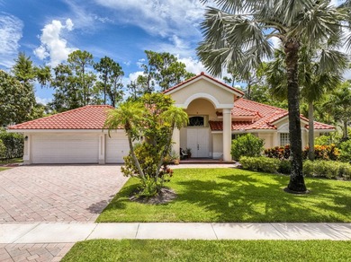 This updated home with NEW ROOF offers an open split floor plan on Binks Forest Golf Club in Florida - for sale on GolfHomes.com, golf home, golf lot