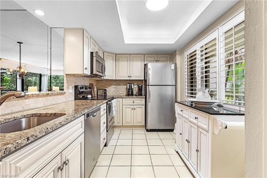 SECOND FLOOR, CORNER UNIT, OFFERED TURNKEY in Bonita Bay with on Bonita Bay West in Florida - for sale on GolfHomes.com, golf home, golf lot