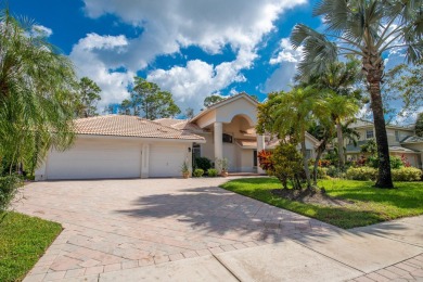 This updated home with NEW ROOF offers an open split floor plan on Binks Forest Golf Club in Florida - for sale on GolfHomes.com, golf home, golf lot