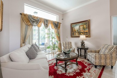 This updated home with NEW ROOF offers an open split floor plan on Binks Forest Golf Club in Florida - for sale on GolfHomes.com, golf home, golf lot