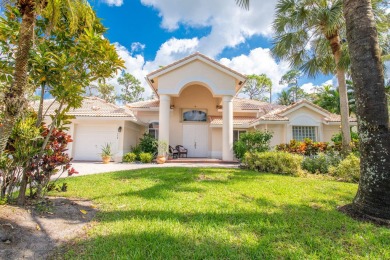 This updated home with NEW ROOF offers an open split floor plan on Binks Forest Golf Club in Florida - for sale on GolfHomes.com, golf home, golf lot