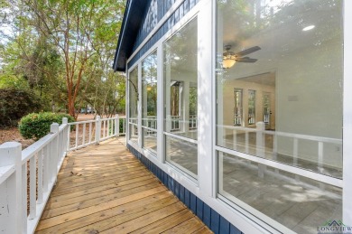 Nestled in a serene, wooded interior lot, this beautifully on Holly Lake Ranch Golf Club in Texas - for sale on GolfHomes.com, golf home, golf lot