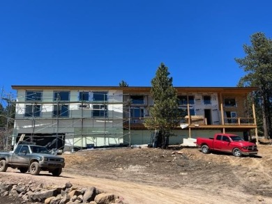 Brand new construction with views of the 4th green on the PGA on Angel Fire Resort Country Club in New Mexico - for sale on GolfHomes.com, golf home, golf lot