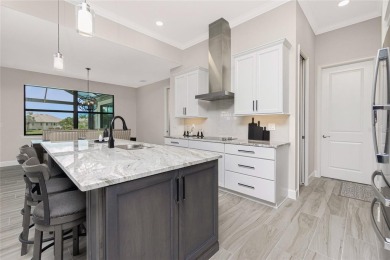 Luxury Golf Course Living with Lake Views on Twin Isles Country on Twin Isles Country Club in Florida - for sale on GolfHomes.com, golf home, golf lot