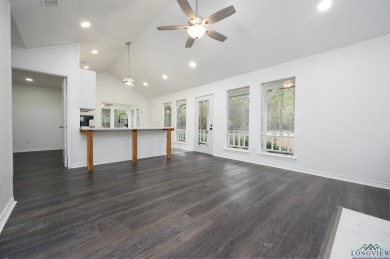Nestled in a serene, wooded interior lot, this beautifully on Holly Lake Ranch Golf Club in Texas - for sale on GolfHomes.com, golf home, golf lot