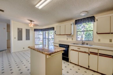 Great 2/2 split floor plan home located on a corner lot in Pine on Pine Lakes Country Club in Florida - for sale on GolfHomes.com, golf home, golf lot