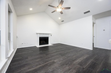 Nestled in a serene, wooded interior lot, this beautifully on Holly Lake Ranch Golf Club in Texas - for sale on GolfHomes.com, golf home, golf lot