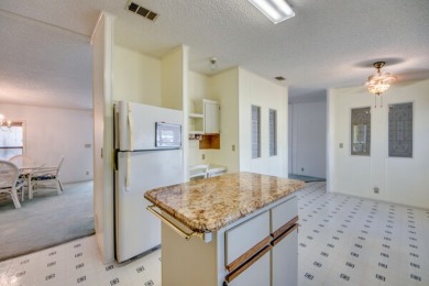 Great 2/2 split floor plan home located on a corner lot in Pine on Pine Lakes Country Club in Florida - for sale on GolfHomes.com, golf home, golf lot