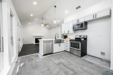 Nestled in a serene, wooded interior lot, this beautifully on Holly Lake Ranch Golf Club in Texas - for sale on GolfHomes.com, golf home, golf lot