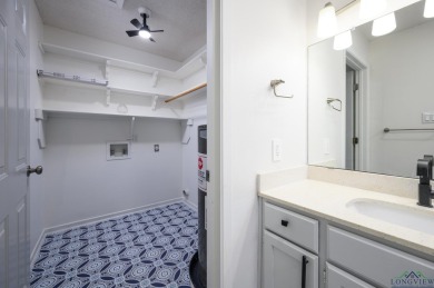 Nestled in a serene, wooded interior lot, this beautifully on Holly Lake Ranch Golf Club in Texas - for sale on GolfHomes.com, golf home, golf lot