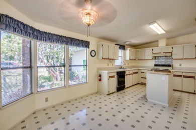 Great 2/2 split floor plan home located on a corner lot in Pine on Pine Lakes Country Club in Florida - for sale on GolfHomes.com, golf home, golf lot