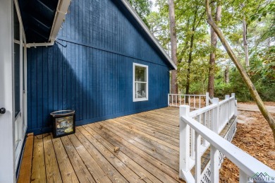 Nestled in a serene, wooded interior lot, this beautifully on Holly Lake Ranch Golf Club in Texas - for sale on GolfHomes.com, golf home, golf lot