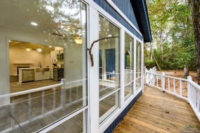 Nestled in a serene, wooded interior lot, this beautifully on Holly Lake Ranch Golf Club in Texas - for sale on GolfHomes.com, golf home, golf lot