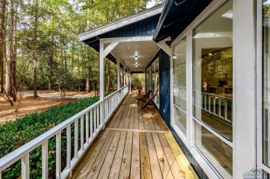 Nestled in a serene, wooded interior lot, this beautifully on Holly Lake Ranch Golf Club in Texas - for sale on GolfHomes.com, golf home, golf lot