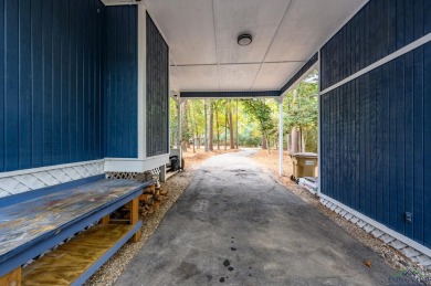 Nestled in a serene, wooded interior lot, this beautifully on Holly Lake Ranch Golf Club in Texas - for sale on GolfHomes.com, golf home, golf lot