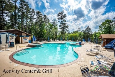 Nestled in a serene, wooded interior lot, this beautifully on Holly Lake Ranch Golf Club in Texas - for sale on GolfHomes.com, golf home, golf lot