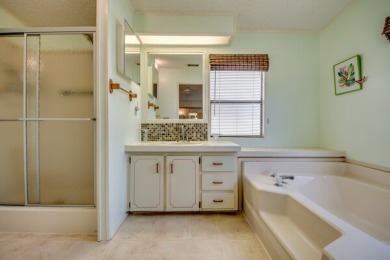 Great 2/2 split floor plan home located on a corner lot in Pine on Pine Lakes Country Club in Florida - for sale on GolfHomes.com, golf home, golf lot