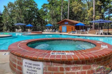 Nestled in a serene, wooded interior lot, this beautifully on Holly Lake Ranch Golf Club in Texas - for sale on GolfHomes.com, golf home, golf lot