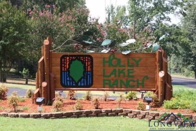 Nestled in a serene, wooded interior lot, this beautifully on Holly Lake Ranch Golf Club in Texas - for sale on GolfHomes.com, golf home, golf lot