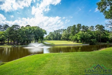 Nestled in a serene, wooded interior lot, this beautifully on Holly Lake Ranch Golf Club in Texas - for sale on GolfHomes.com, golf home, golf lot