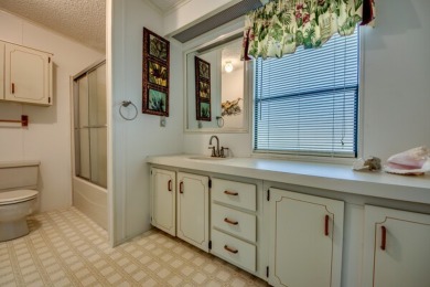 Great 2/2 split floor plan home located on a corner lot in Pine on Pine Lakes Country Club in Florida - for sale on GolfHomes.com, golf home, golf lot