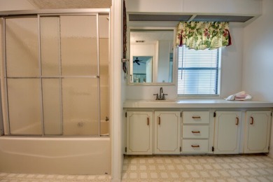 Great 2/2 split floor plan home located on a corner lot in Pine on Pine Lakes Country Club in Florida - for sale on GolfHomes.com, golf home, golf lot