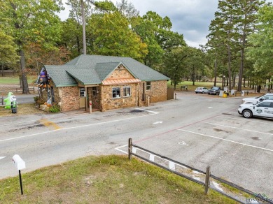 Nestled in a serene, wooded interior lot, this beautifully on Holly Lake Ranch Golf Club in Texas - for sale on GolfHomes.com, golf home, golf lot
