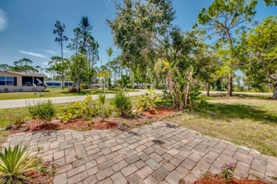 Great 2/2 split floor plan home located on a corner lot in Pine on Pine Lakes Country Club in Florida - for sale on GolfHomes.com, golf home, golf lot