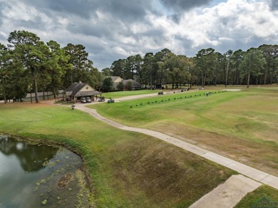 Nestled in a serene, wooded interior lot, this beautifully on Holly Lake Ranch Golf Club in Texas - for sale on GolfHomes.com, golf home, golf lot
