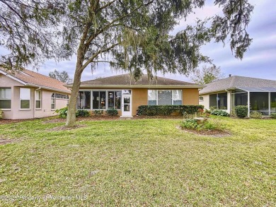 A brand new roof will top this beautiful home before closing! on Hernando Oaks Golf and Country Club in Florida - for sale on GolfHomes.com, golf home, golf lot