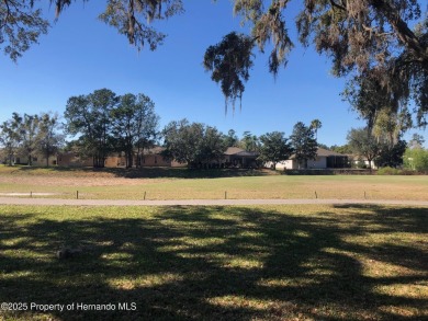 A brand new roof will top this beautiful home before closing! on Hernando Oaks Golf and Country Club in Florida - for sale on GolfHomes.com, golf home, golf lot