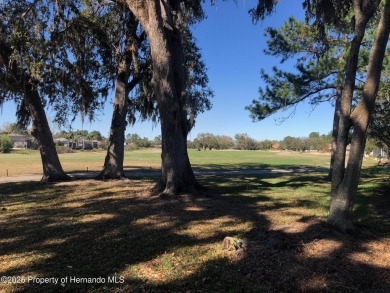 A brand new roof will top this beautiful home before closing! on Hernando Oaks Golf and Country Club in Florida - for sale on GolfHomes.com, golf home, golf lot