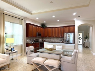 YOU'LL LOVE YOUR LIFE WITH PEACEFUL LAKE VIEWS of BEAUTIFUL on Gateway Golf and Country Club in Florida - for sale on GolfHomes.com, golf home, golf lot