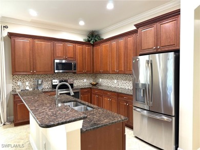 YOU'LL LOVE YOUR LIFE WITH PEACEFUL LAKE VIEWS of BEAUTIFUL on Gateway Golf and Country Club in Florida - for sale on GolfHomes.com, golf home, golf lot