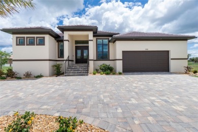 Luxury Golf Course Living with Lake Views on Twin Isles Country on Twin Isles Country Club in Florida - for sale on GolfHomes.com, golf home, golf lot