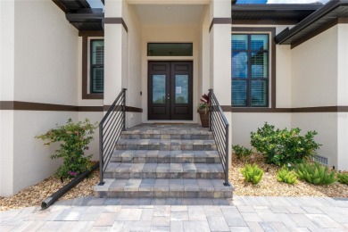 Luxury Golf Course Living with Lake Views on Twin Isles Country on Twin Isles Country Club in Florida - for sale on GolfHomes.com, golf home, golf lot