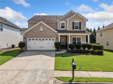 Welcome to this meticulously maintained northeast-facing home in on Sugar Hill Golf Club in Georgia - for sale on GolfHomes.com, golf home, golf lot