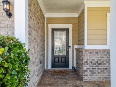 Welcome to this meticulously maintained northeast-facing home in on Sugar Hill Golf Club in Georgia - for sale on GolfHomes.com, golf home, golf lot