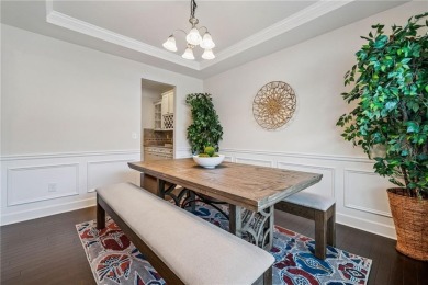 Welcome to this meticulously maintained northeast-facing home in on Sugar Hill Golf Club in Georgia - for sale on GolfHomes.com, golf home, golf lot