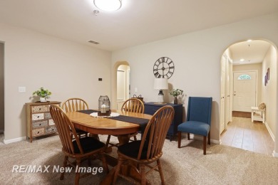 Completely Redone in 2023! This stunning first-floor, end unit on Swan Valley Golf Club in Michigan - for sale on GolfHomes.com, golf home, golf lot