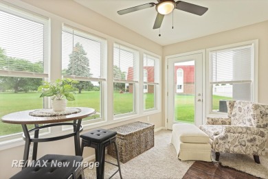 Completely Redone in 2023! This stunning first-floor, end unit on Swan Valley Golf Club in Michigan - for sale on GolfHomes.com, golf home, golf lot
